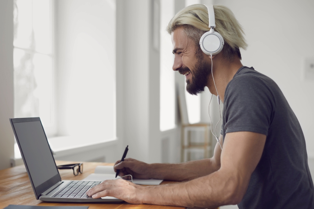 Man in front of the laptop